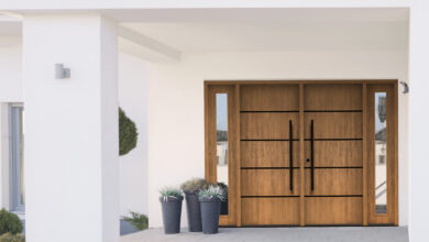 MASTERGRAIN fiberglass door in Cherry, Contemporary Stainless Inlay in Tea with Milk stain by Sherwin Williams.